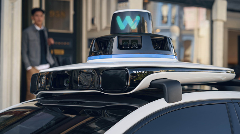 A Waymo autonomous vehicle on a public road.