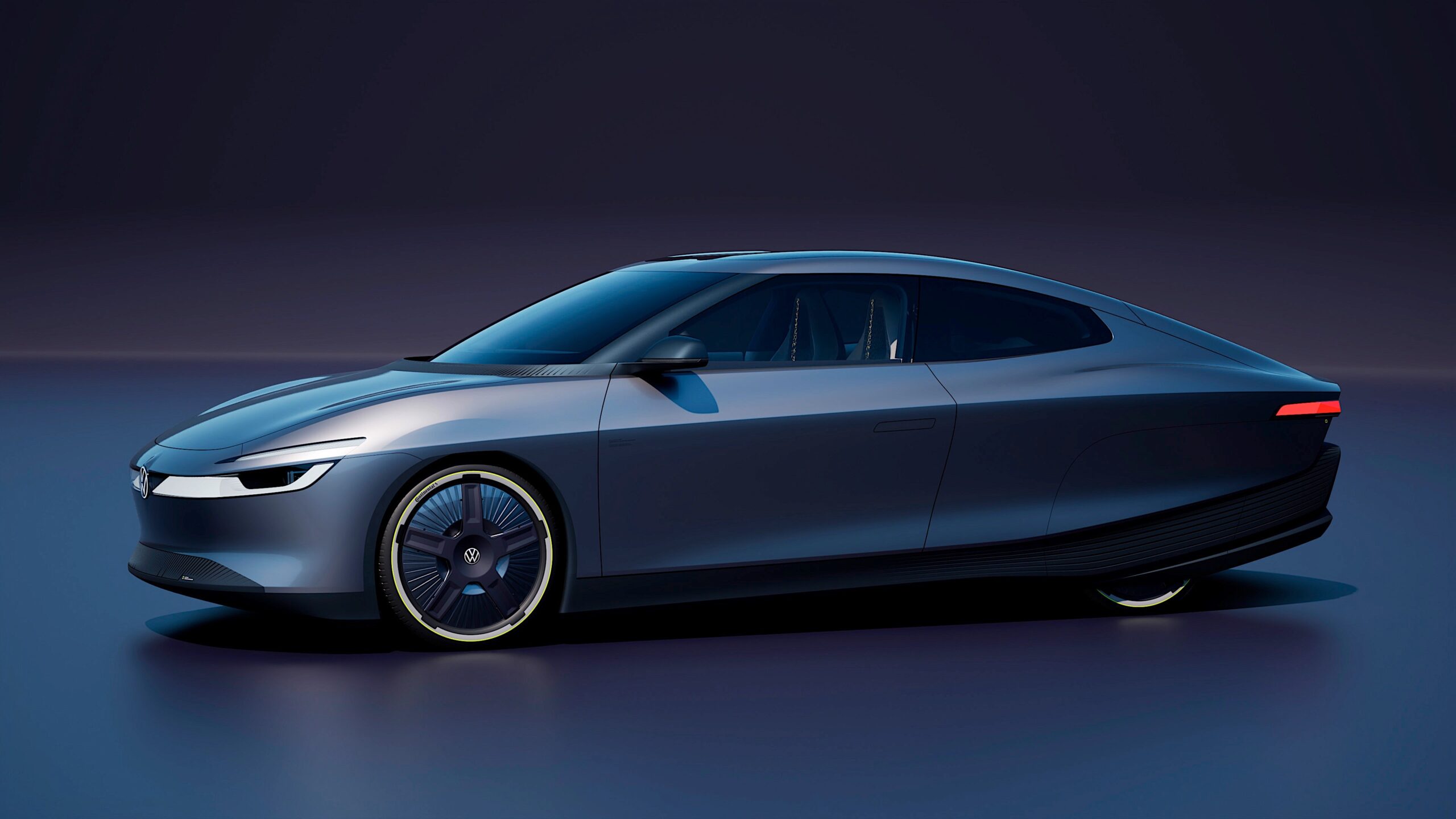 The Volkswagen Mission Efficiency prototype, a low teardrop-shaped coupe with clad rear wheels.