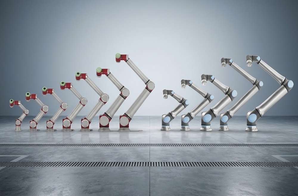 A JAKA collaborative robot arm beside a Universal Robots collaborative robot arm